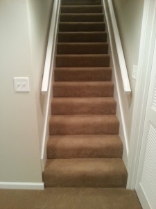 Basement Finish, Carpeted Stairs and Handrails